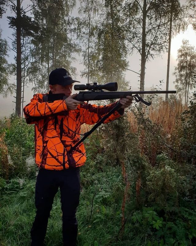 Skjutstöd och vapenrem i ett